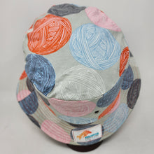 Load image into Gallery viewer, Upholstery lining + Yarn Balls Upcycled Reversible Bucket Hat - Xtra Small